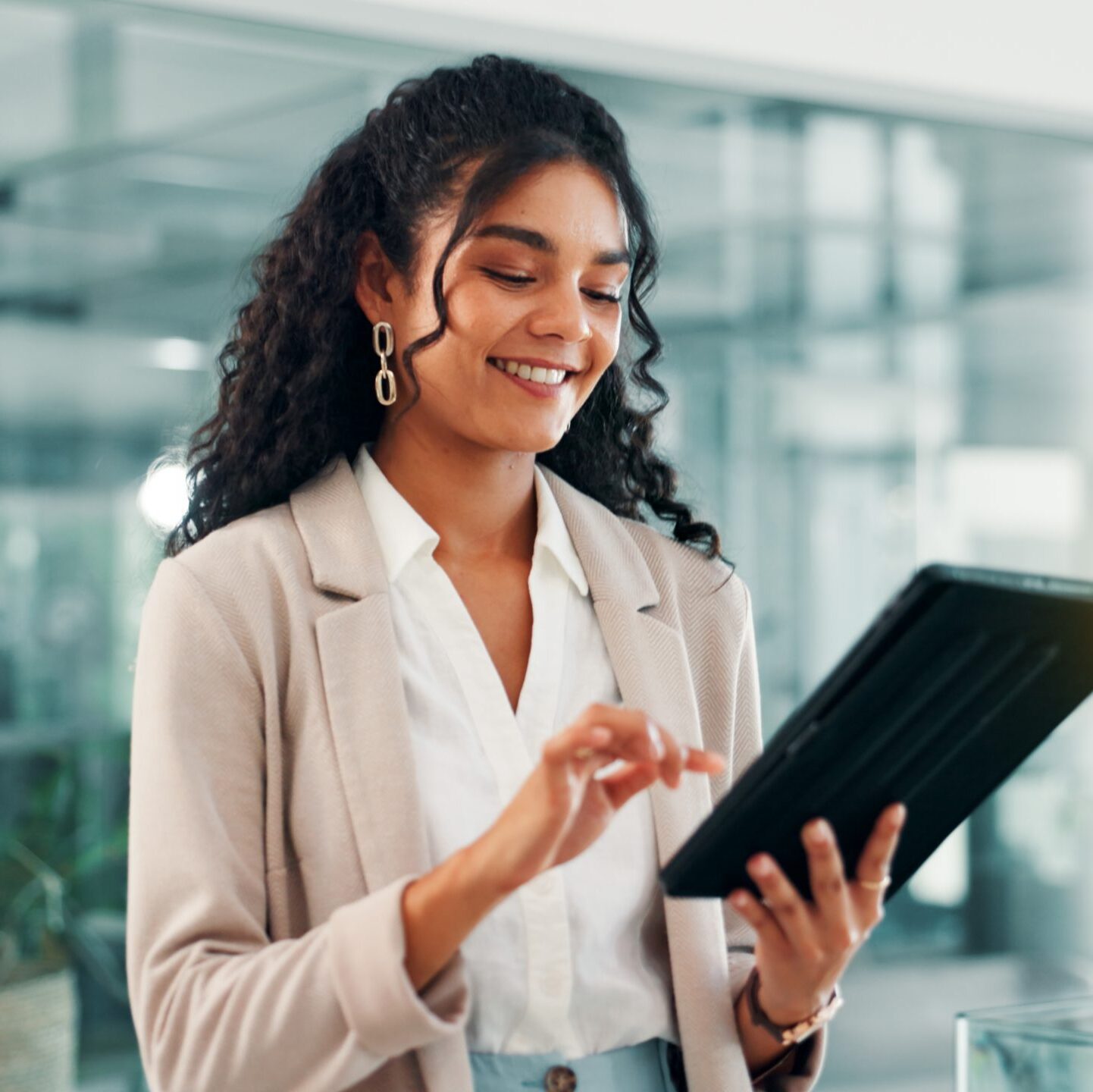 App, smile and tablet with business woman in office for information, project management, report. Internet, lens flare and review with happy employee in professional workplace for company development